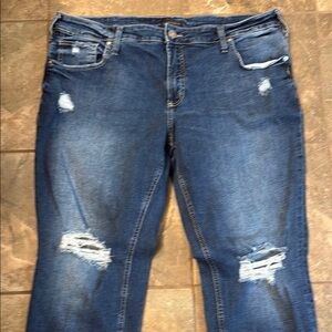 Women's Distressed Blue Jeans